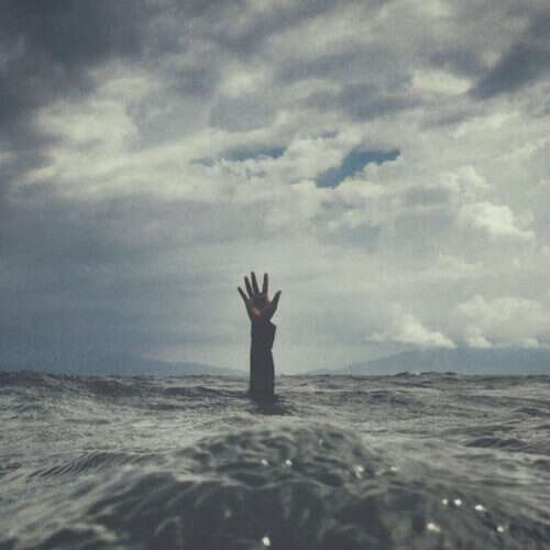 hand reaching out of water