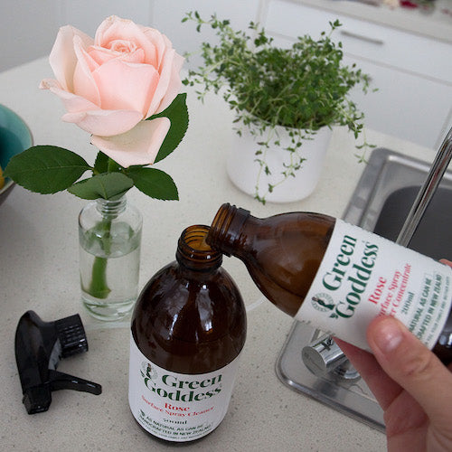 Rose spray cleaner concentrate pouring