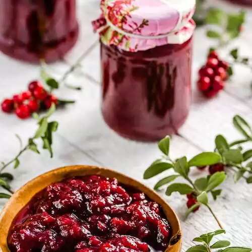 beetroot relish in a jar on table, natural organic food - homemade preserve for winter