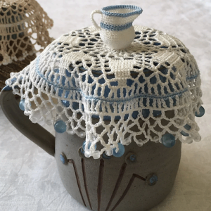 crochet jug cover pattern with little jug