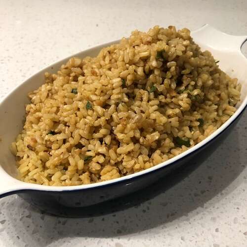 yummy brown rice with almonds in dish