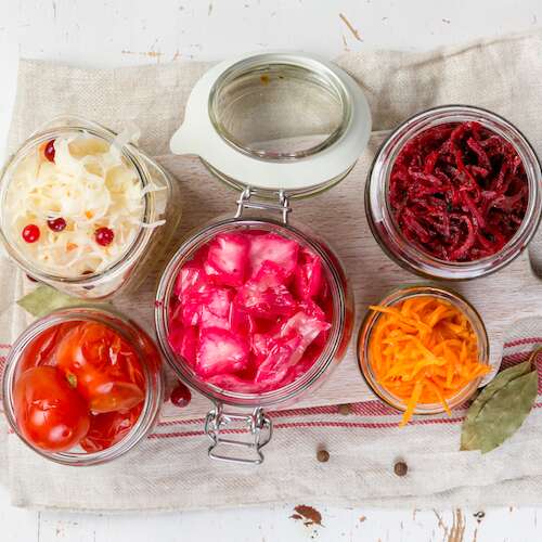 Fermented food gut health - carrot, cabbage, tomatoes, beetroot,
