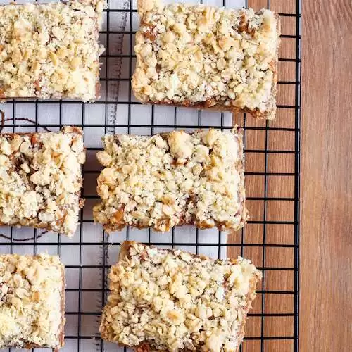 apple pie oat bars on a rack