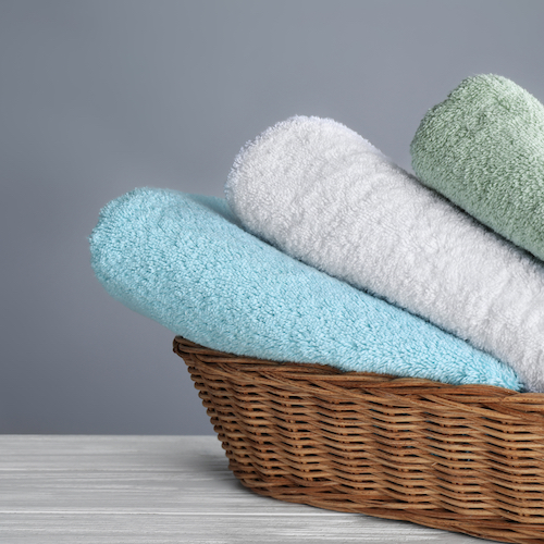 Fresh towels in a basket