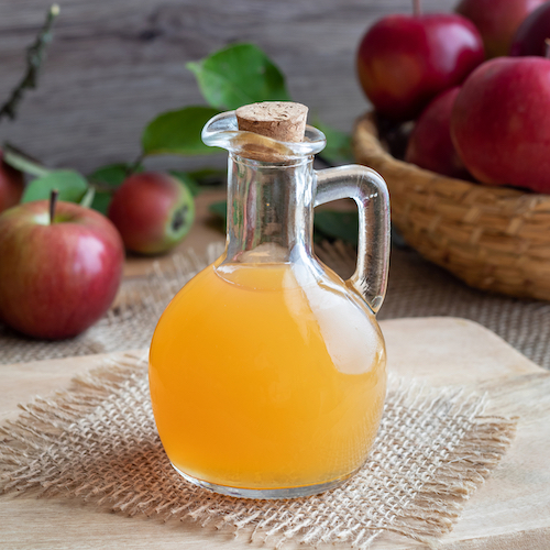 A bottle of raw unfiltered apple cider vinegar